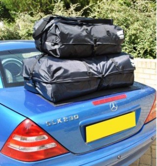 Car Boot Bag from Boot-Bag.com: boot-bag is a waterproof luggage bag that attaches to your car's boot lid using a unique strapping system. The bag sits on a non slip mat to protect your paintwork. It's an alternative to the traditional luggage or boot rack, that's guaranteed to chip the edge of your boot lid and if you buy a luggage rack you still need waterproof luggage.