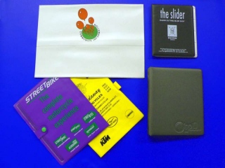 Binders: Binders are a good way to present your company at a conference or meeting. Bespoke sizes and special materials can be used to enhance a simple folder or binder. Printing and plastic  ticket pockets can be added to take business cards or loyalty cards.